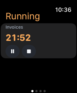 The Apple Watch app showing a running session with pause and stop controls